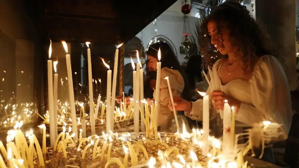 I palestinesi cristiani celebrano la Domenica delle Palme presso la Basilica della Natività a Betlemme