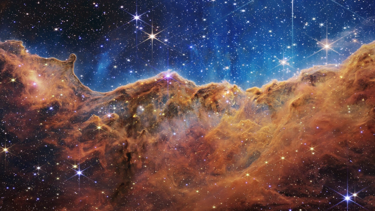 Le &ldquo;scogliere cosmiche&rdquo; della nubulosa della Carena immortalate dal telescopio spaziale James Webb (foto Nasa, Esa, Csa, StSci)